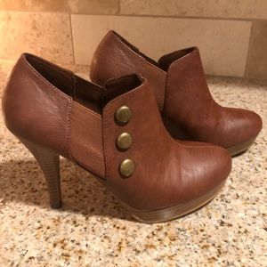 Brown ankle boot with heel.